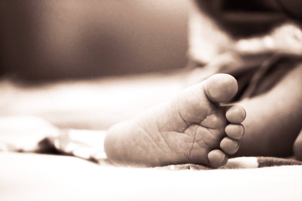 Tragic Loss: Newborn Dies Following C-Section After Mother Allegedly Shot by Ex