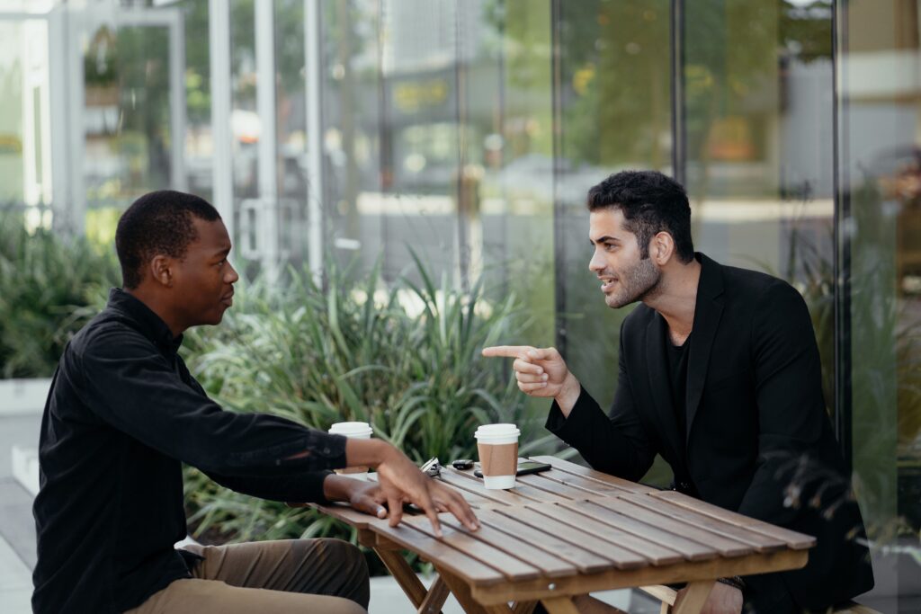two-men-having-a-conversation