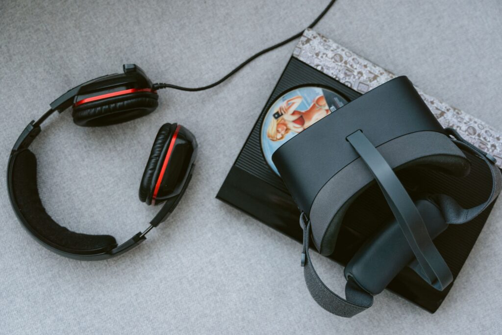 black-virtual-headset-and-headphones-on-the-floor